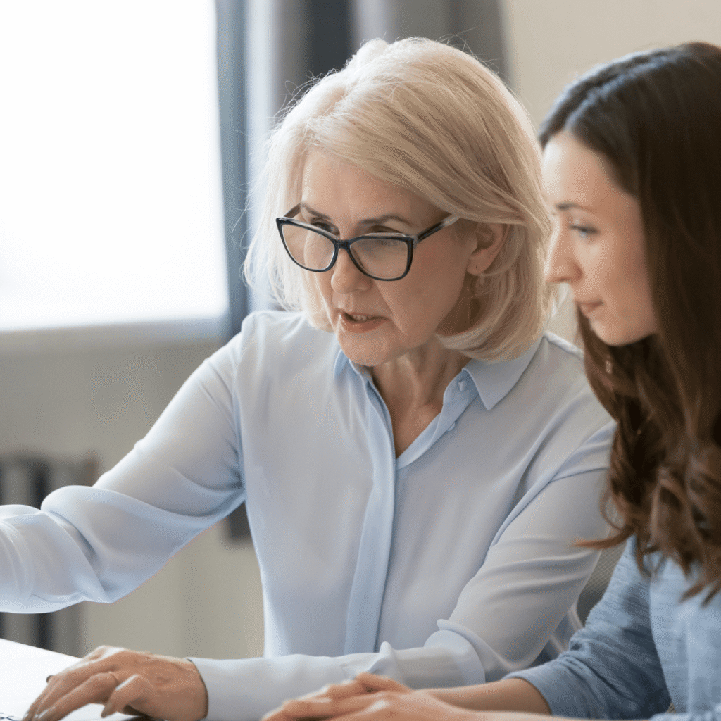 Nonprofit CEO consulting with board members – Beacon Consult